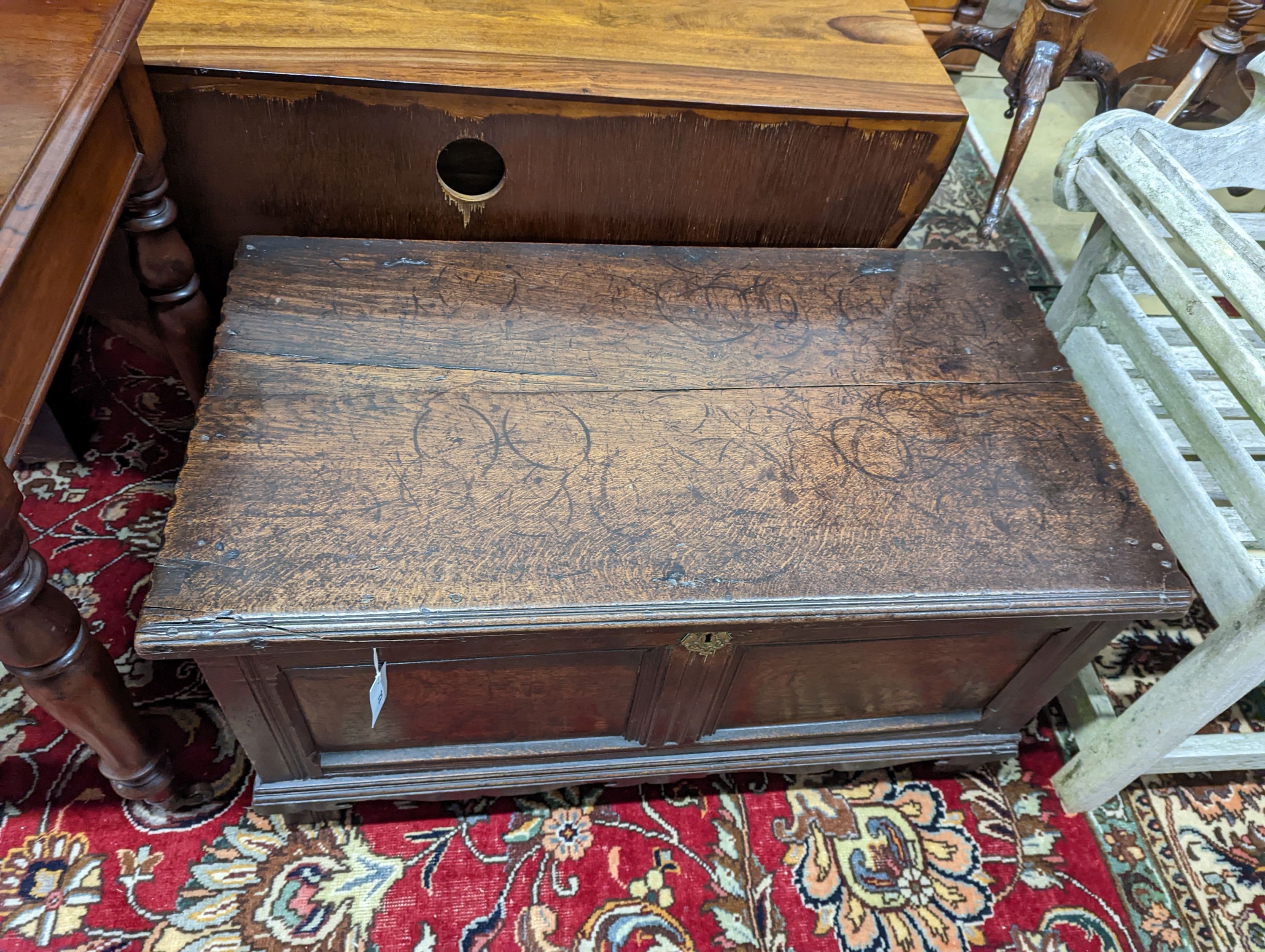 An 18th century panelled oak coffer, length 98cm, depth 54cm, height 59cm